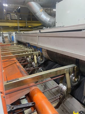 Equipment that creates corrugated sheets for packaging. This is a rotary die-cutter at York’s facility.